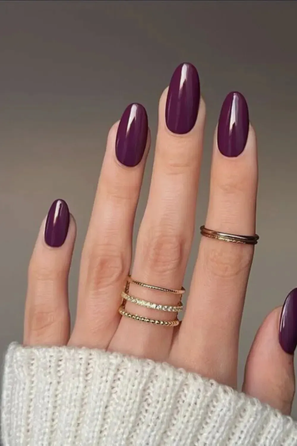 Glossy Purple Nails - Luxurious glossy purple nails offering a shiny, deep hue.