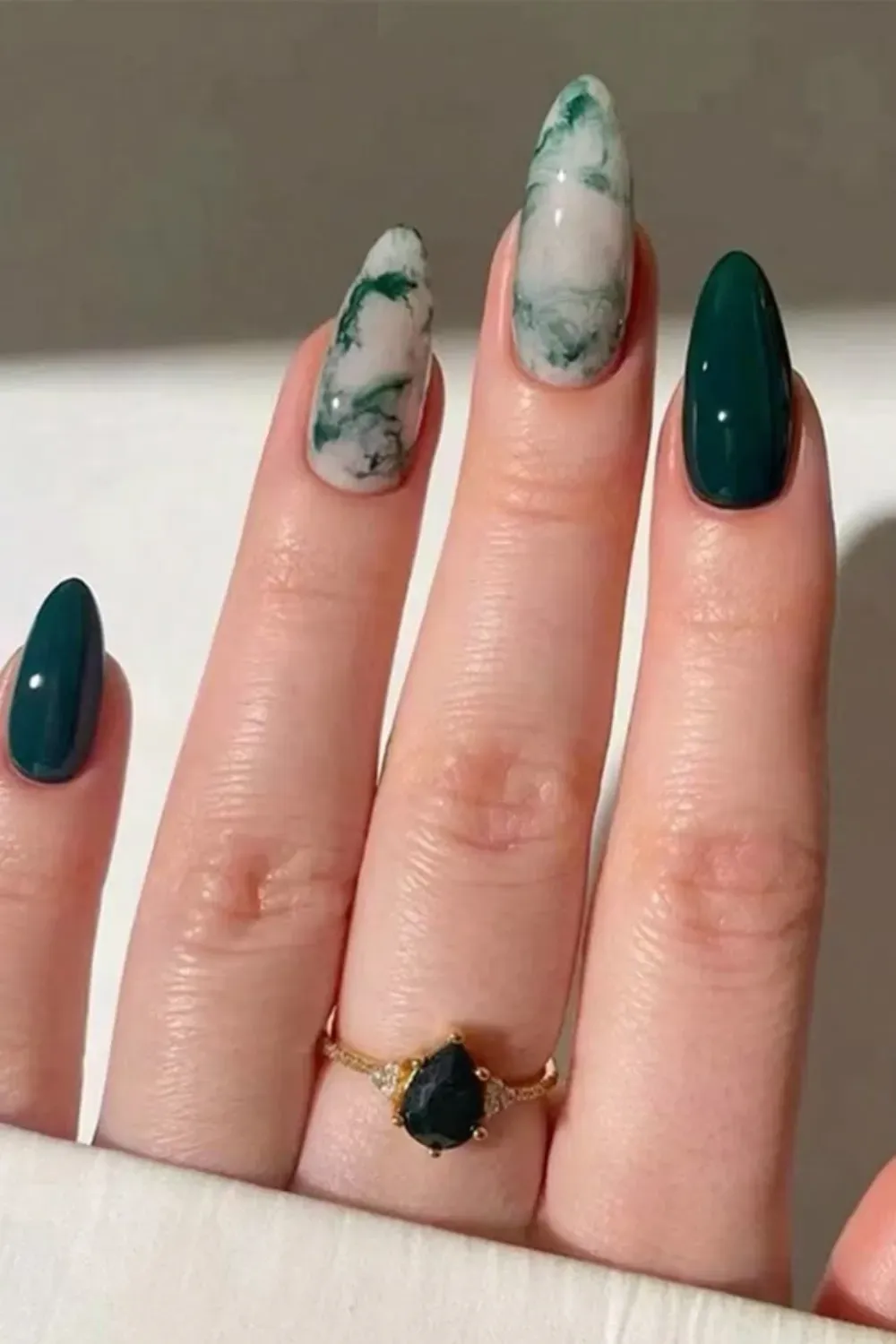 Marble & Emerald Green Nails - Elegant marble and emerald green nails for a sophisticated look in 2025.