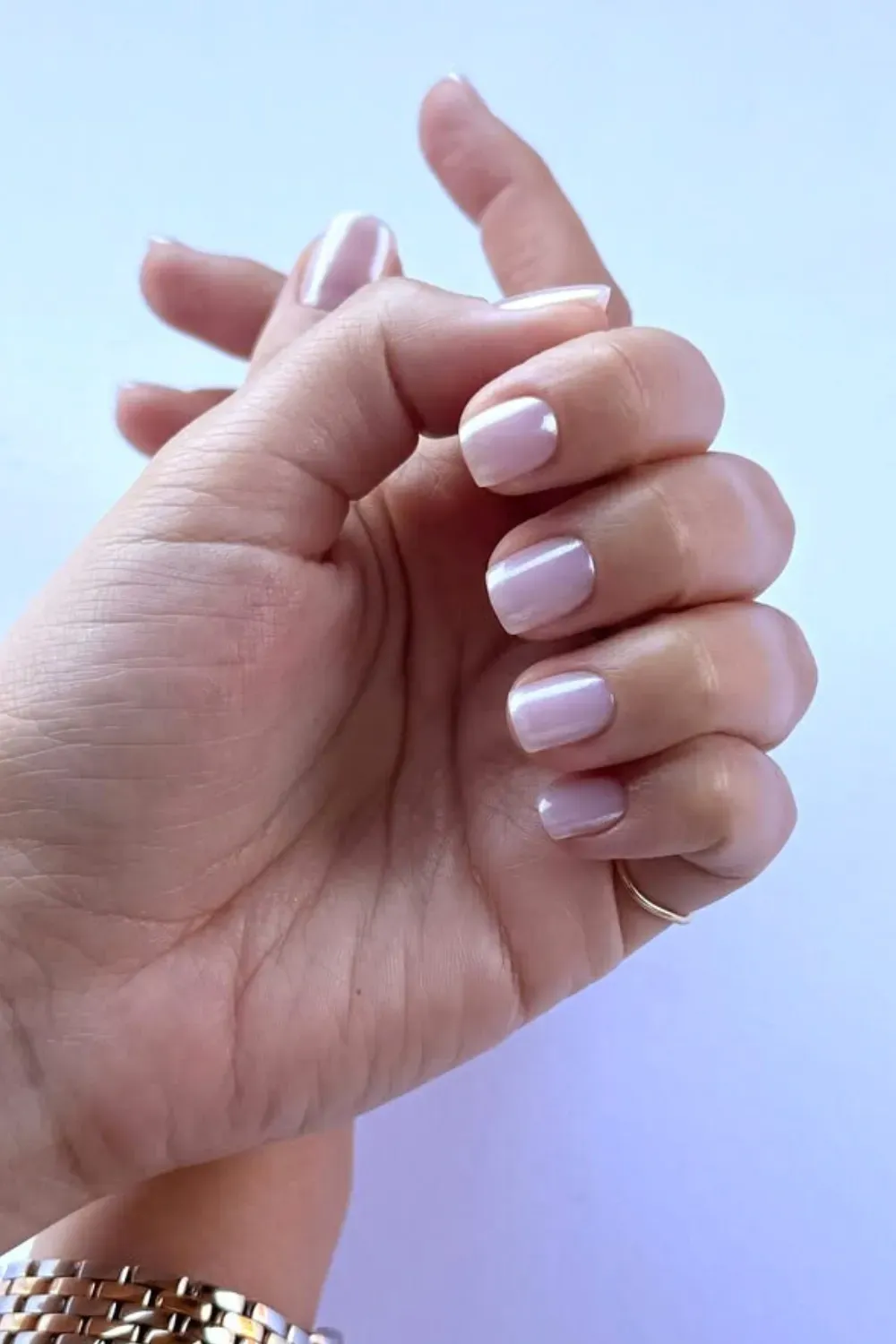 Subtle and polished minimalist nude nails for a simple, chic look