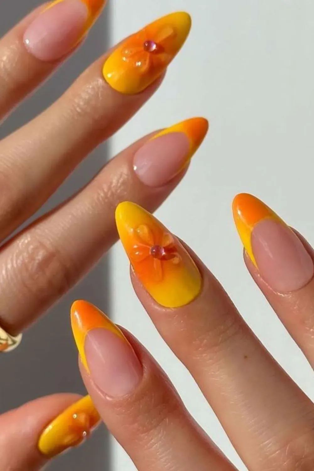 Tangerine 3D Floral Nails - Almond nails with yellow and orange ombré French tips and 3D flowers
