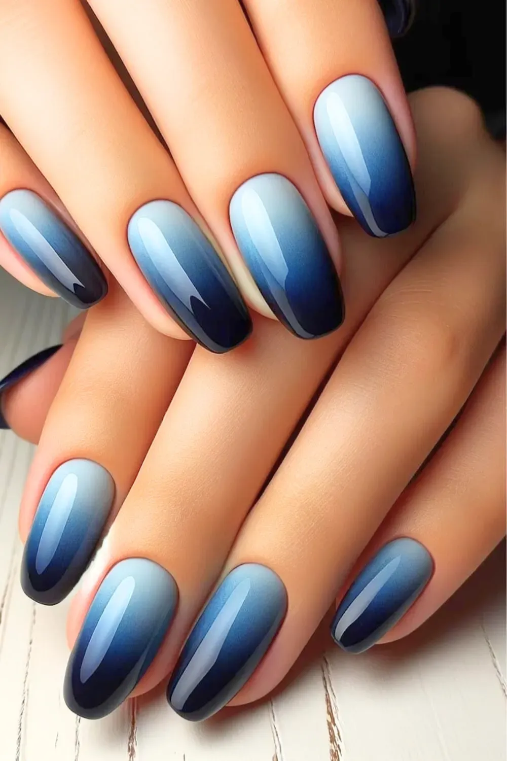 Ombre Blue Nails - Beautiful ombre nails transitioning from dark blue to light blue for a stunning, chic look.