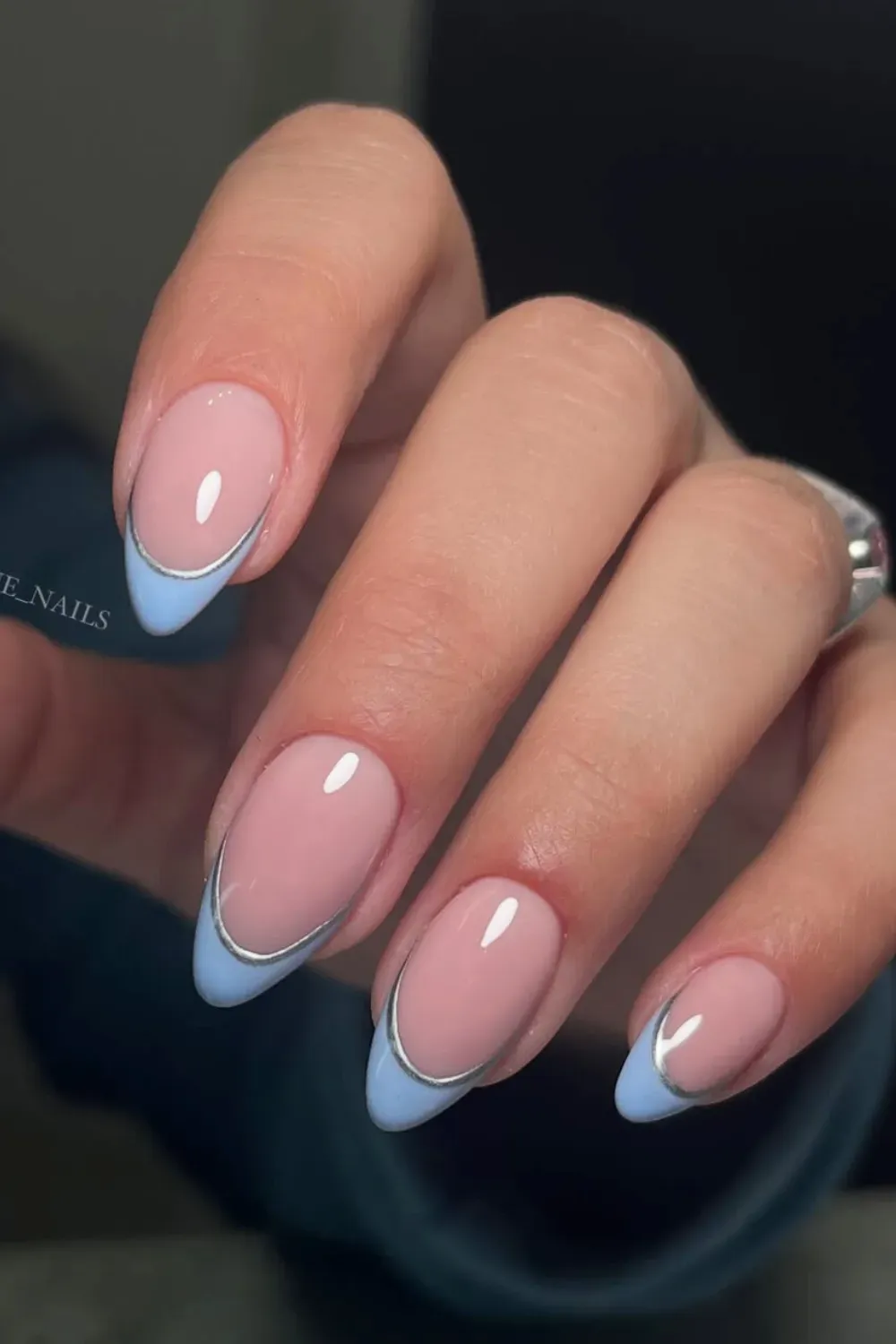 Pastel blue French tips with silver detailing