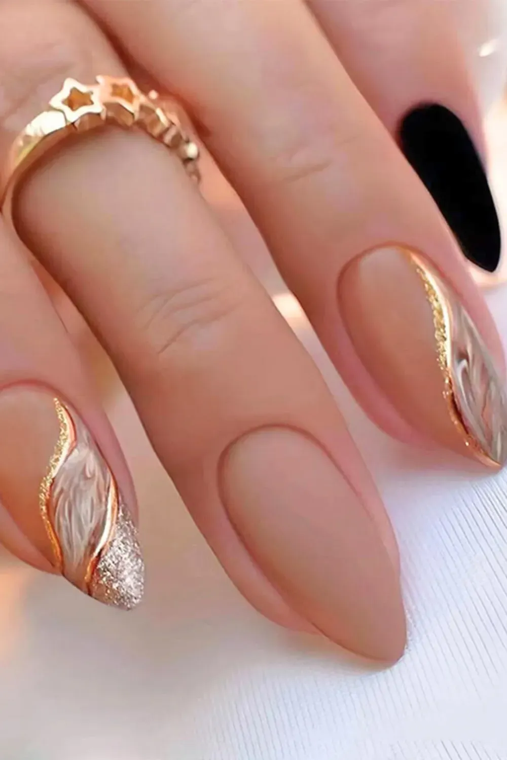 Subtle Mauve with Metallic Detailing - Subtle mauve nails with metallic detailing, offering a chic and modern look.