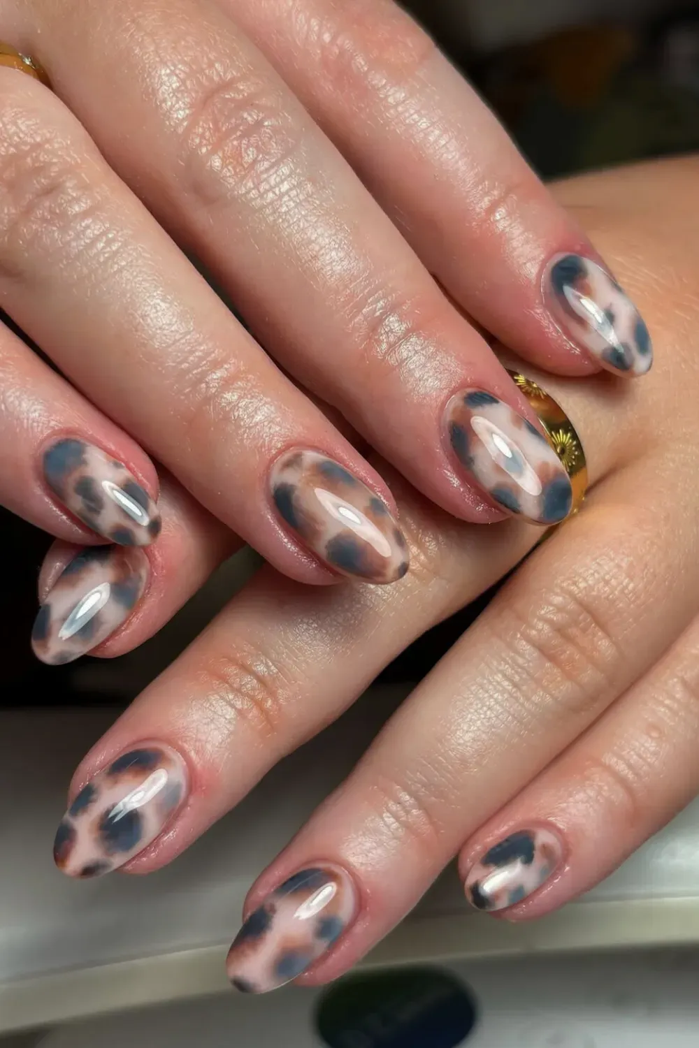 Autumn Marble and Gold Halloween Nails - Autumn-colored marble nails with gold accents for a sophisticated Halloween style