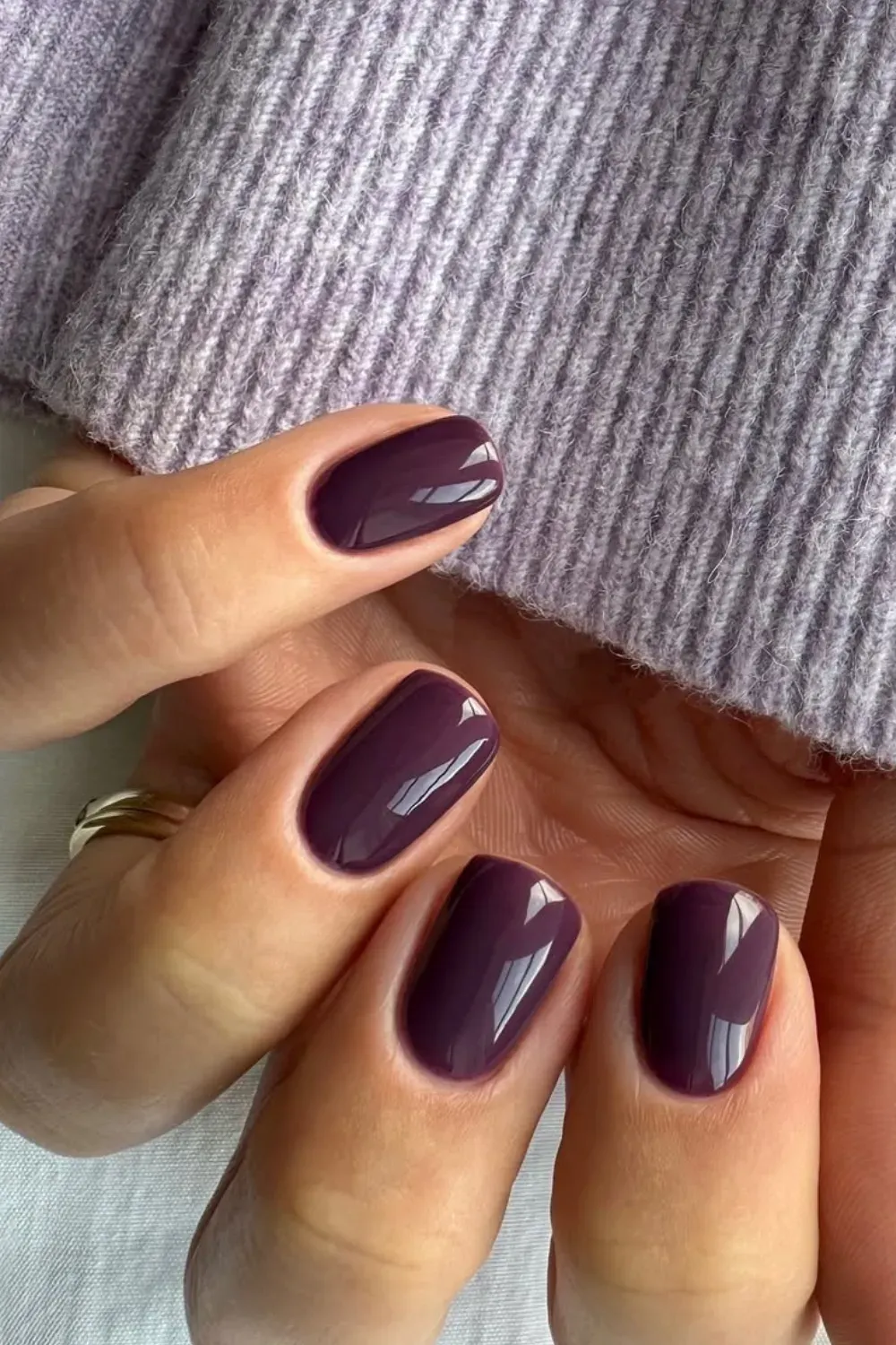 Berry-inspired burgundy nails with a glossy finish