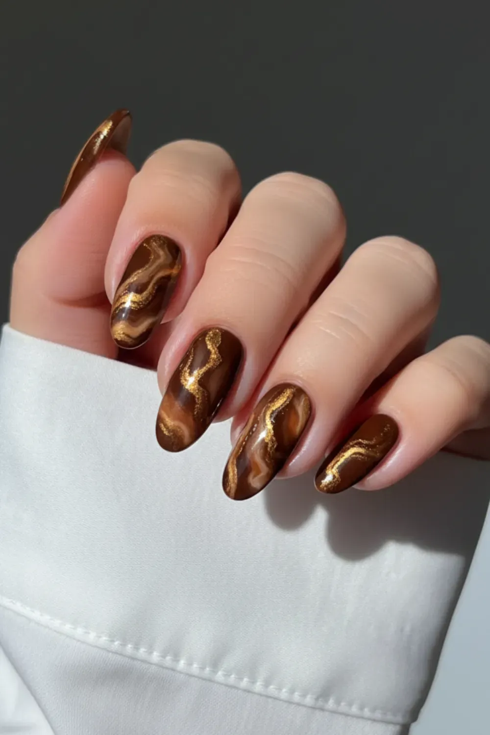 Brown and Gold Marble Nails - Luxe brown and gold marble nails with a sophisticated design for autumn