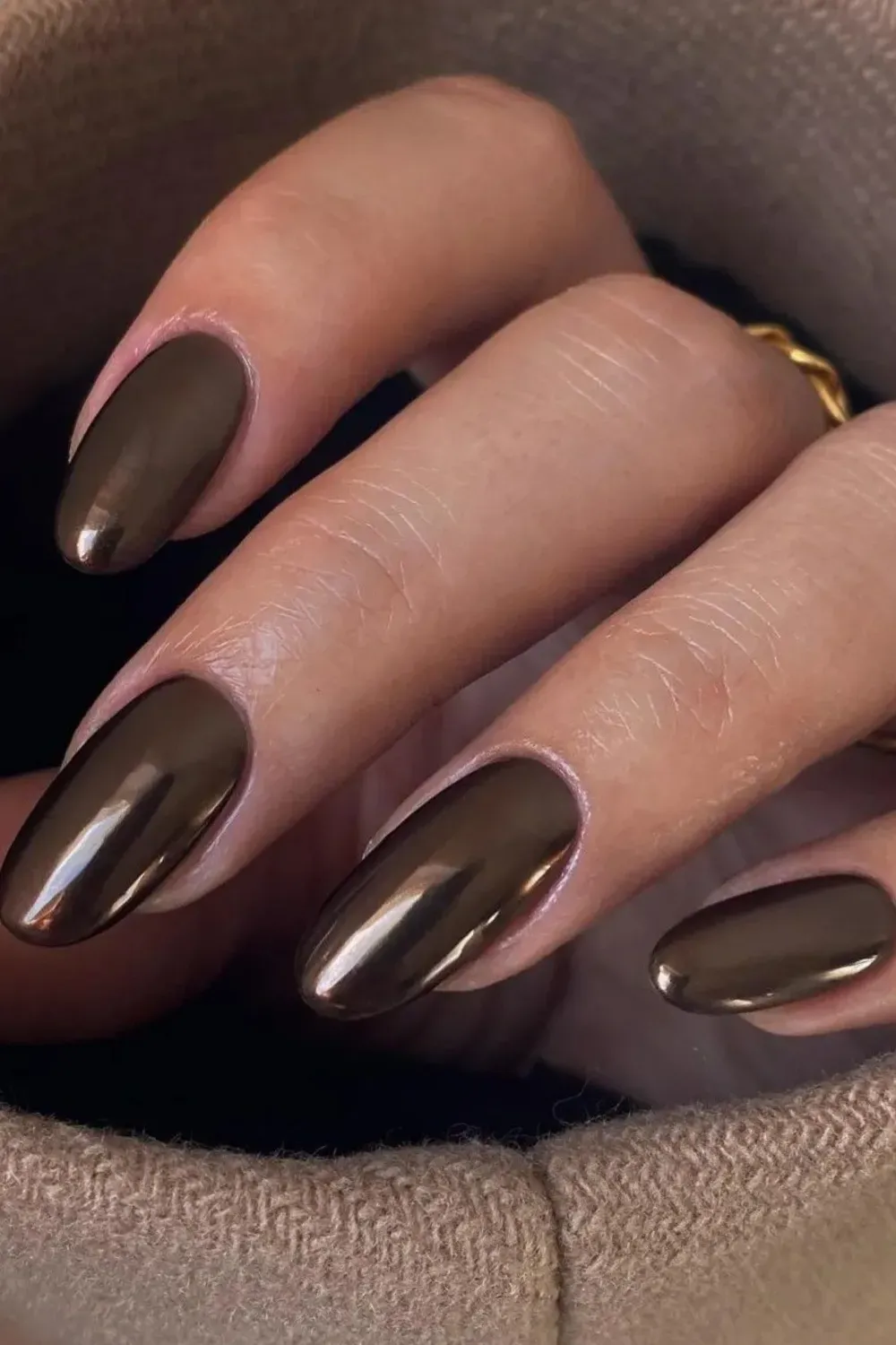 Sleek chrome brown nails with a metallic finish, perfect for a modern and elegant fall manicure