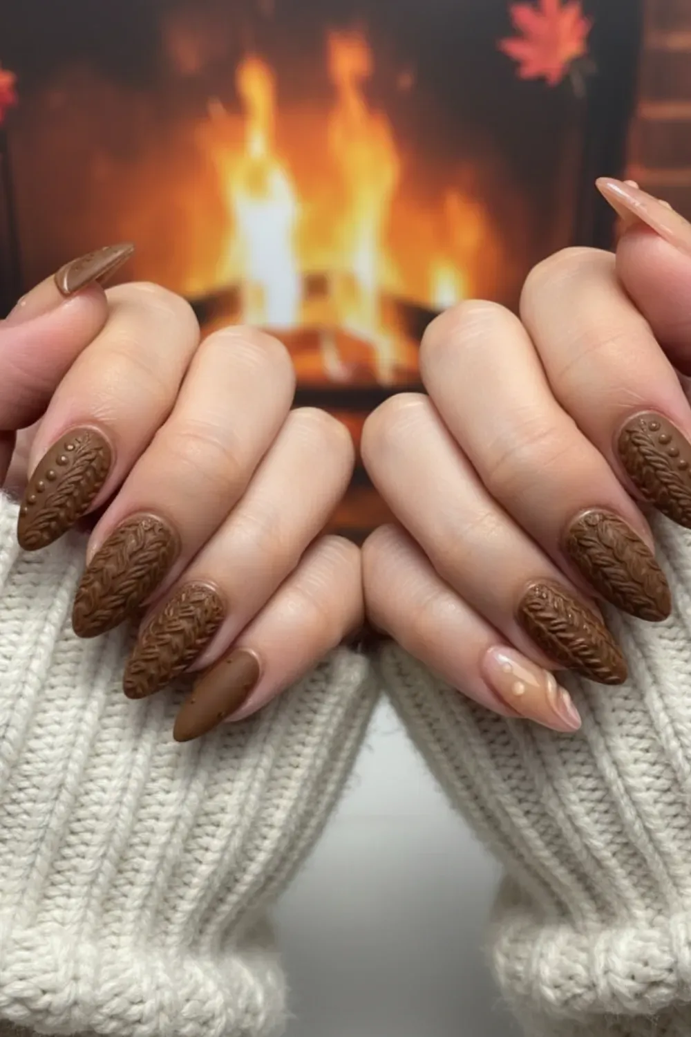 Cozy Sweater Nail Design - Cozy sweater-inspired nails in warm fall shades like brown and cream