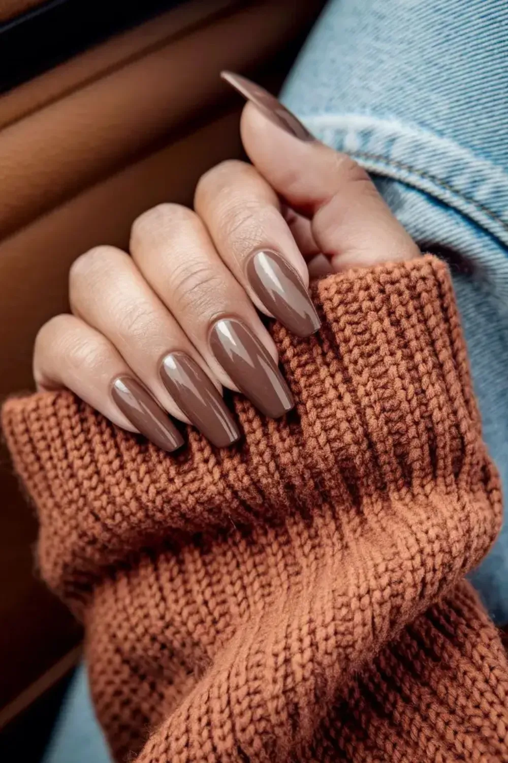 Stylish brown glossy nails with a sleek finish, perfect for an elegant and sophisticated fall manicure