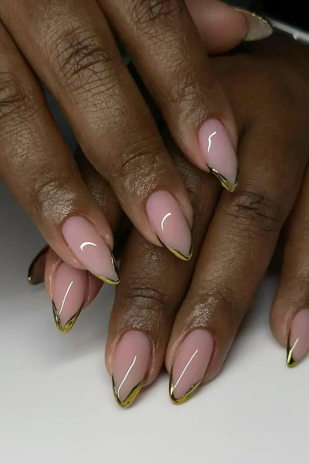 Gold French Tips - Luxuriate in the elegance of gold French tips, the perfect way to add a touch of sophistication to your nails.