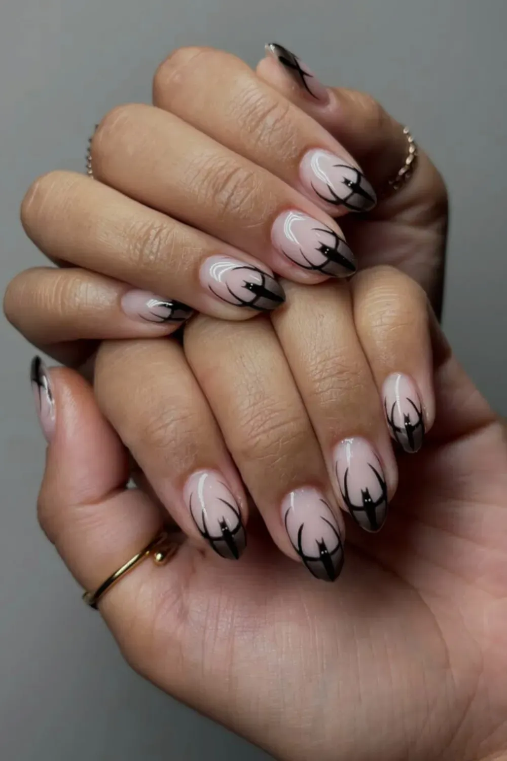 Grunge Rock Halloween Nails - Rock-inspired grunge nails with dark, messy designs and metallic accents, ideal for Halloween