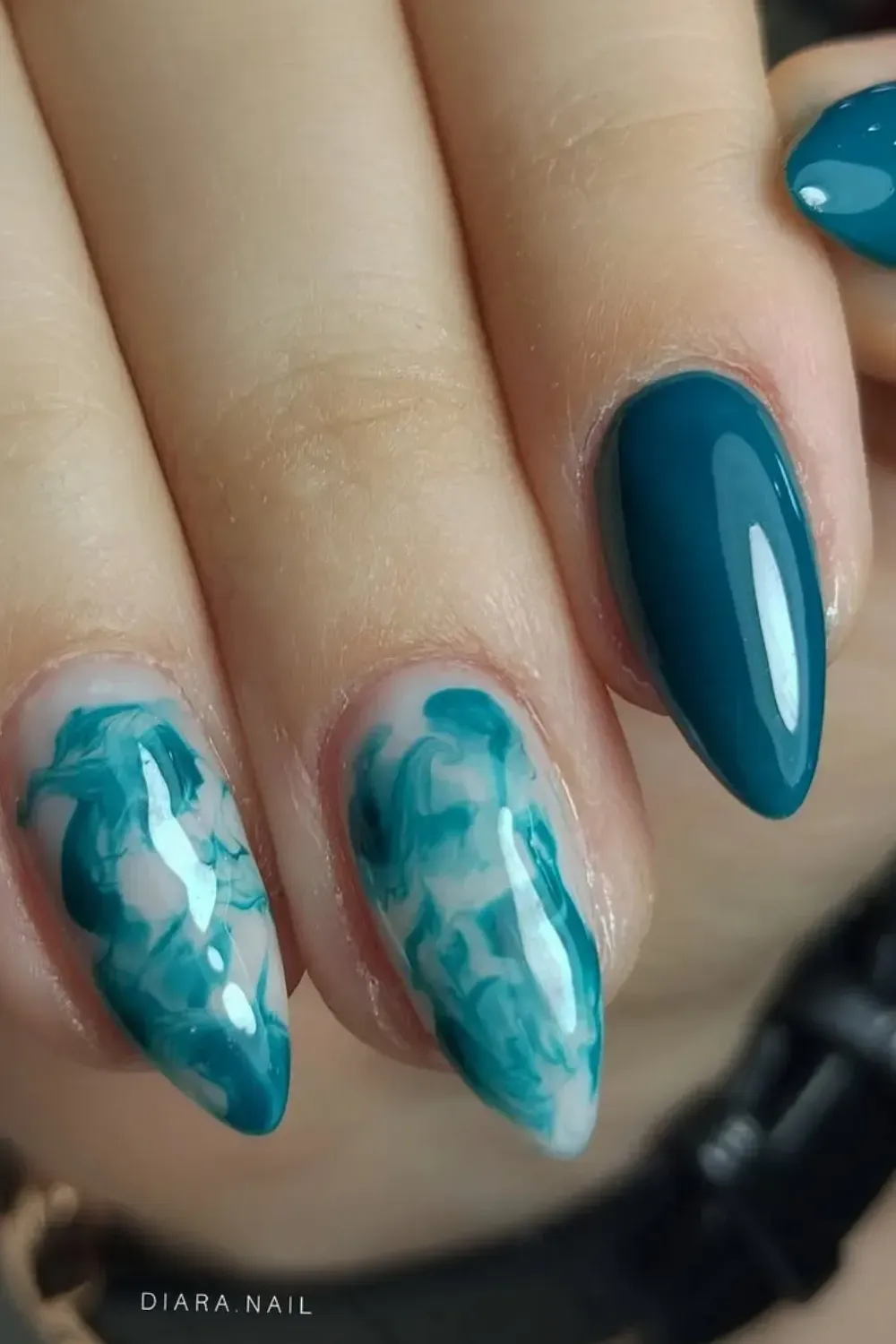 Marble Nail Design with Teal and White Swirls - Elegant marble nails with soft teal and white swirls, giving off a luxurious vibe.