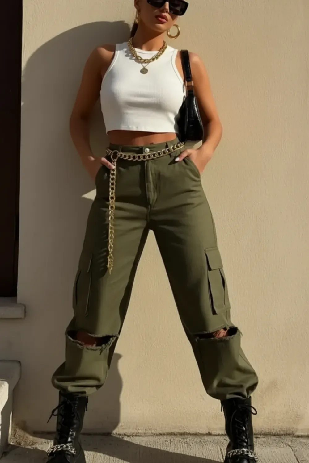 Olive Cargo Pants with a Twist - Olive cargo pants paired with a cropped white top, chunky boots, and oversized sunglasses