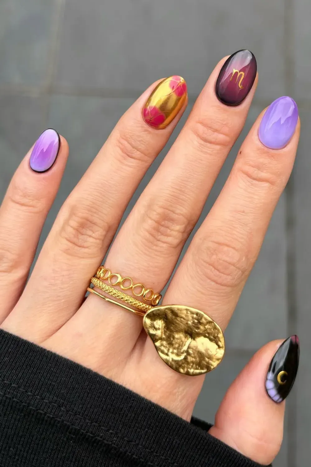 Scorpio-Inspired Nails  - Scorpio-inspired nail art with deep purples, black, and gold chrome accents