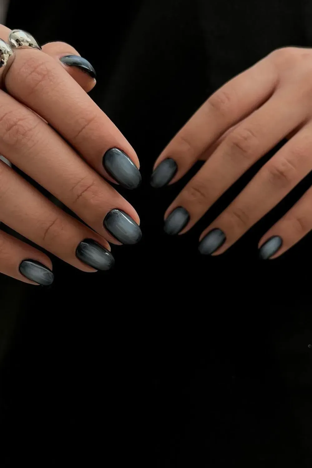 Elegant Metallic Ombre Halloween Nails - Smooth ombre nails transitioning from black to silver, perfect for Halloween.