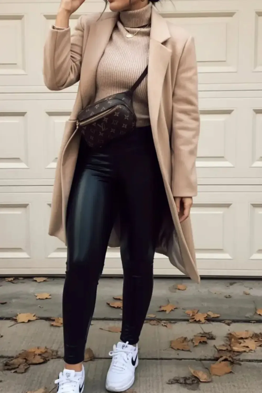  Sporty Fall Outfit with Sneakers - Fall outfit with a beige coat, black leggings, and white sneakers for a sporty-chic vibe.