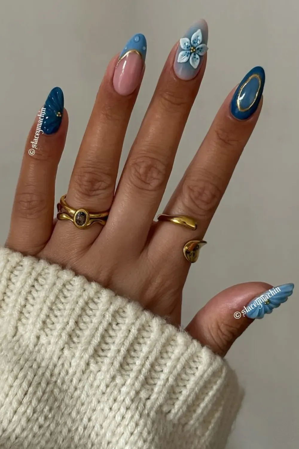 Floral Accents - Navy blue and nude nails in a sleek, minimalist design