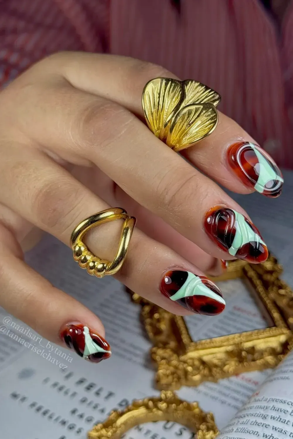 Swirled Marble Halloween Nails - Trendy swirled marble nails in warm autumn tones with a Halloween twist