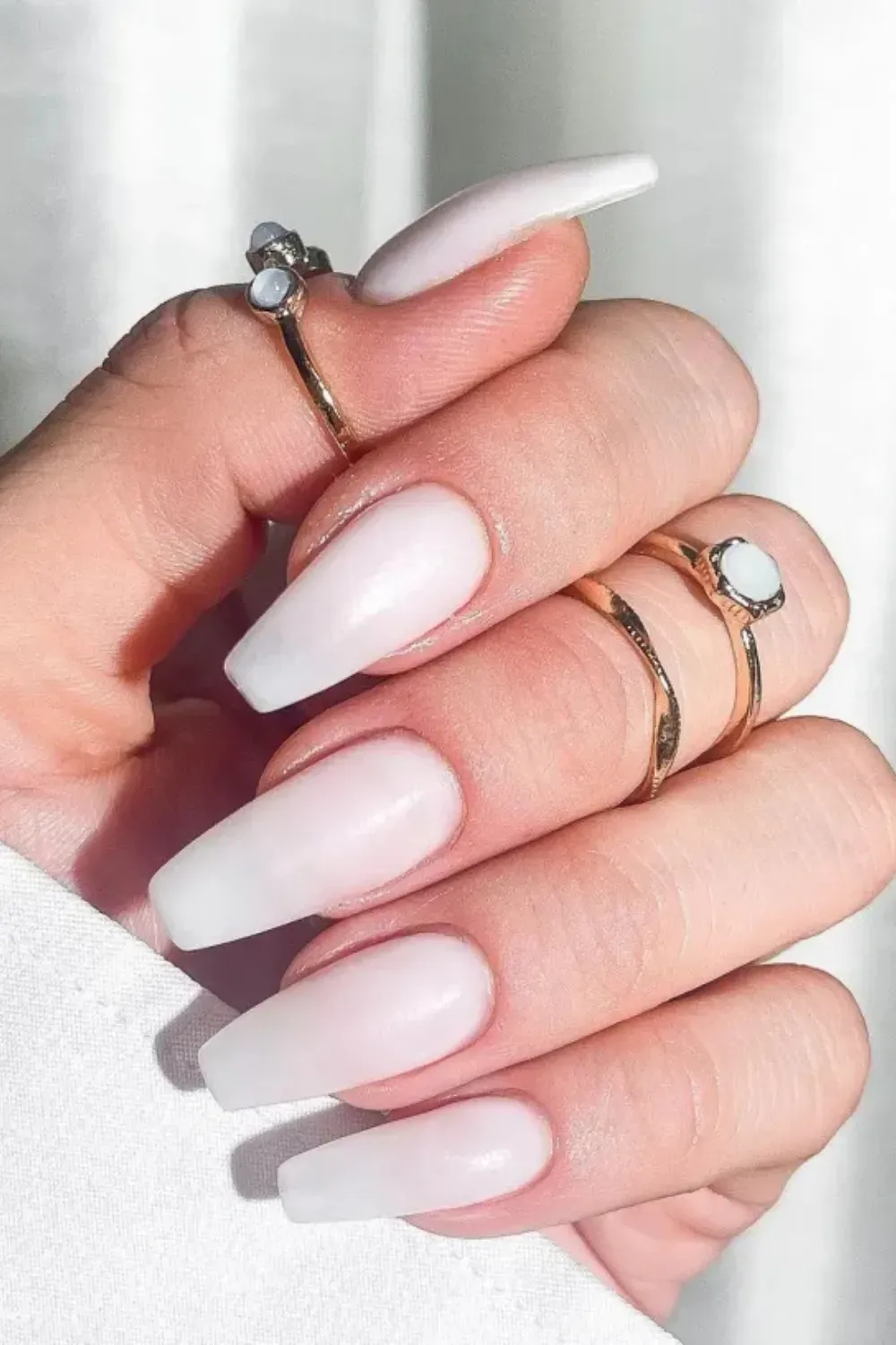 Matte Milky White Coffin Nails - Long coffin-shaped nails with a semi-opaque milky white polish and a matte topcoat.