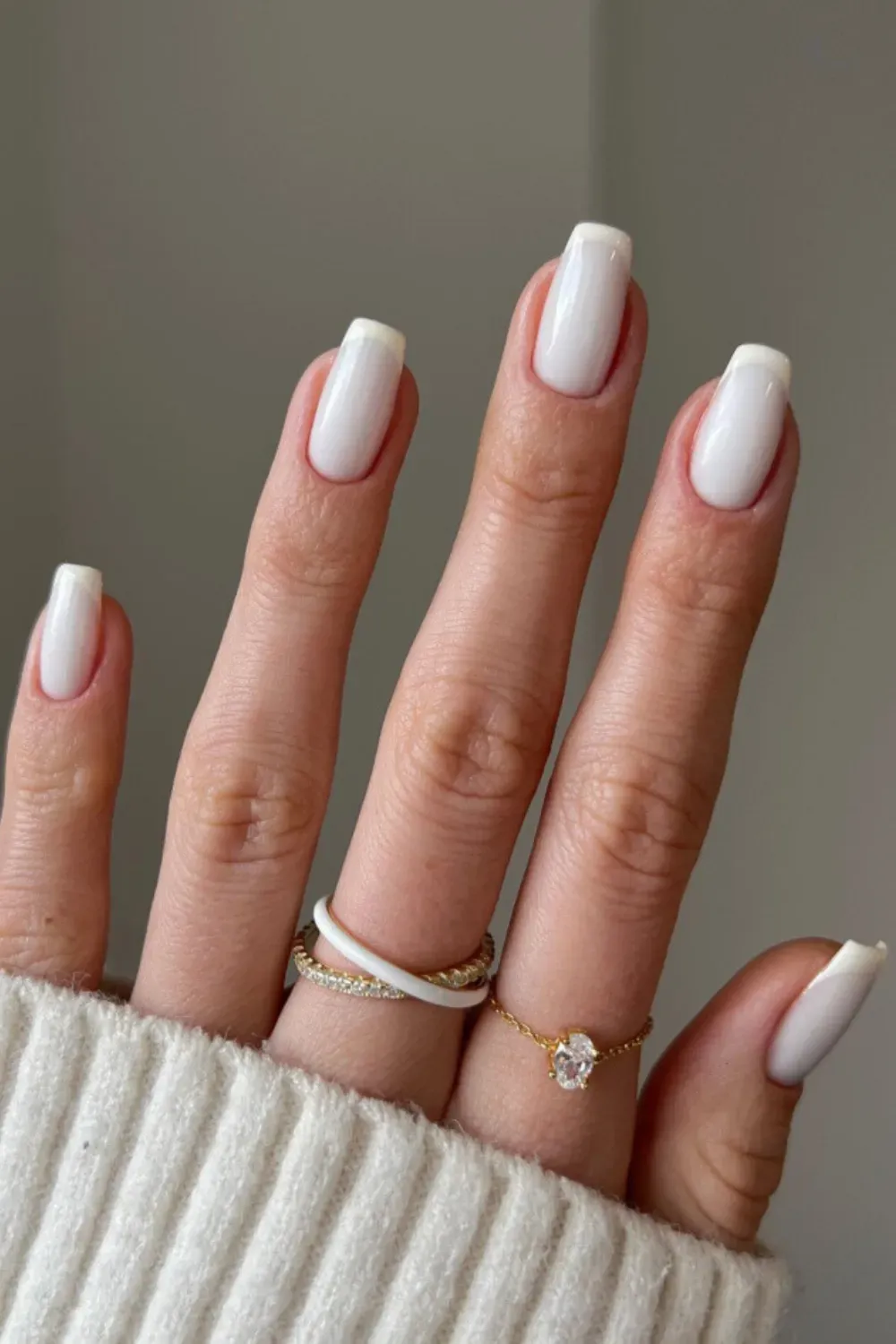 Modern Milky White French Tip Manicure - Long, square-shaped nails with a glossy milky white base and crisp, opaque white French tips.