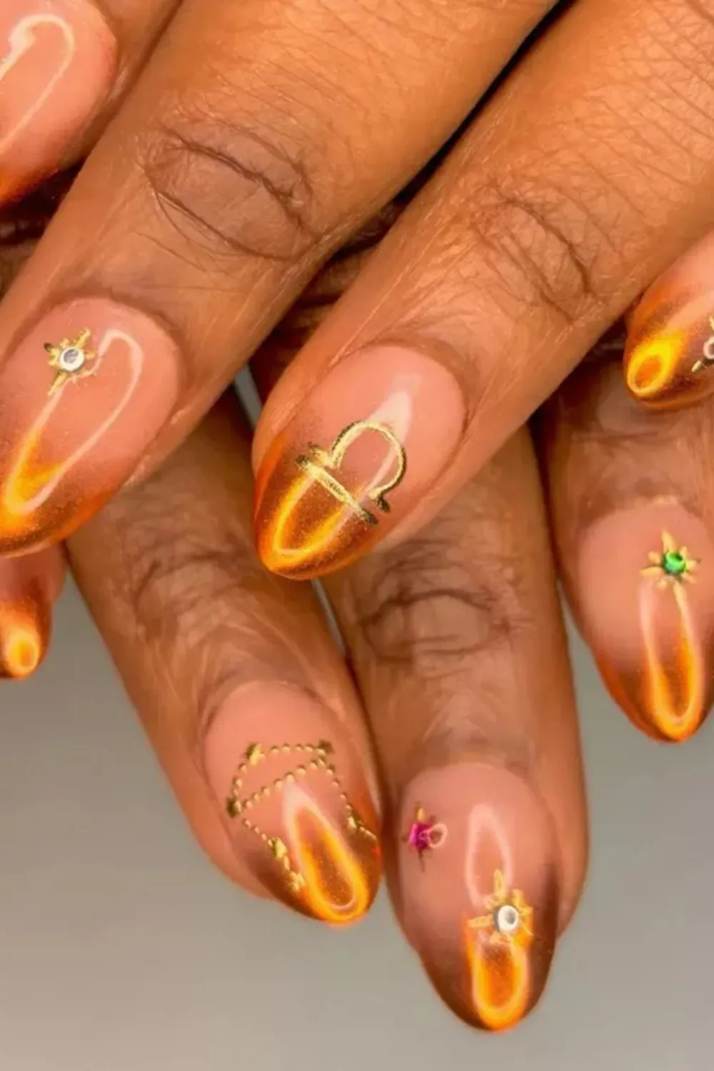 Orange Aura Flame Nails with Charms - Fiery aura nails with metallic orange glow and decorative elements