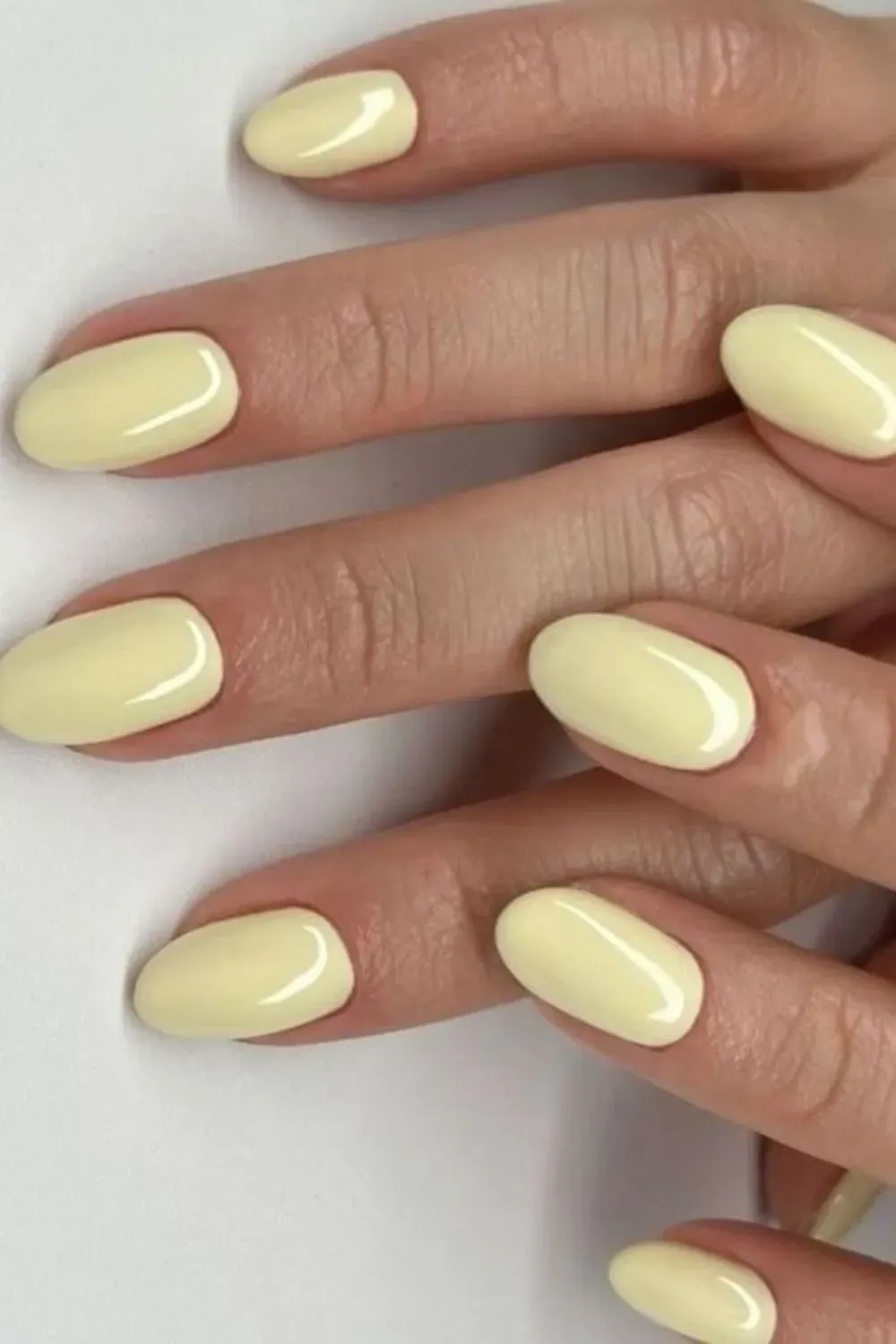 Short Almond Butter Yellow Glossy Nails - Glossy butter yellow short almond nails with a bright, fresh feel