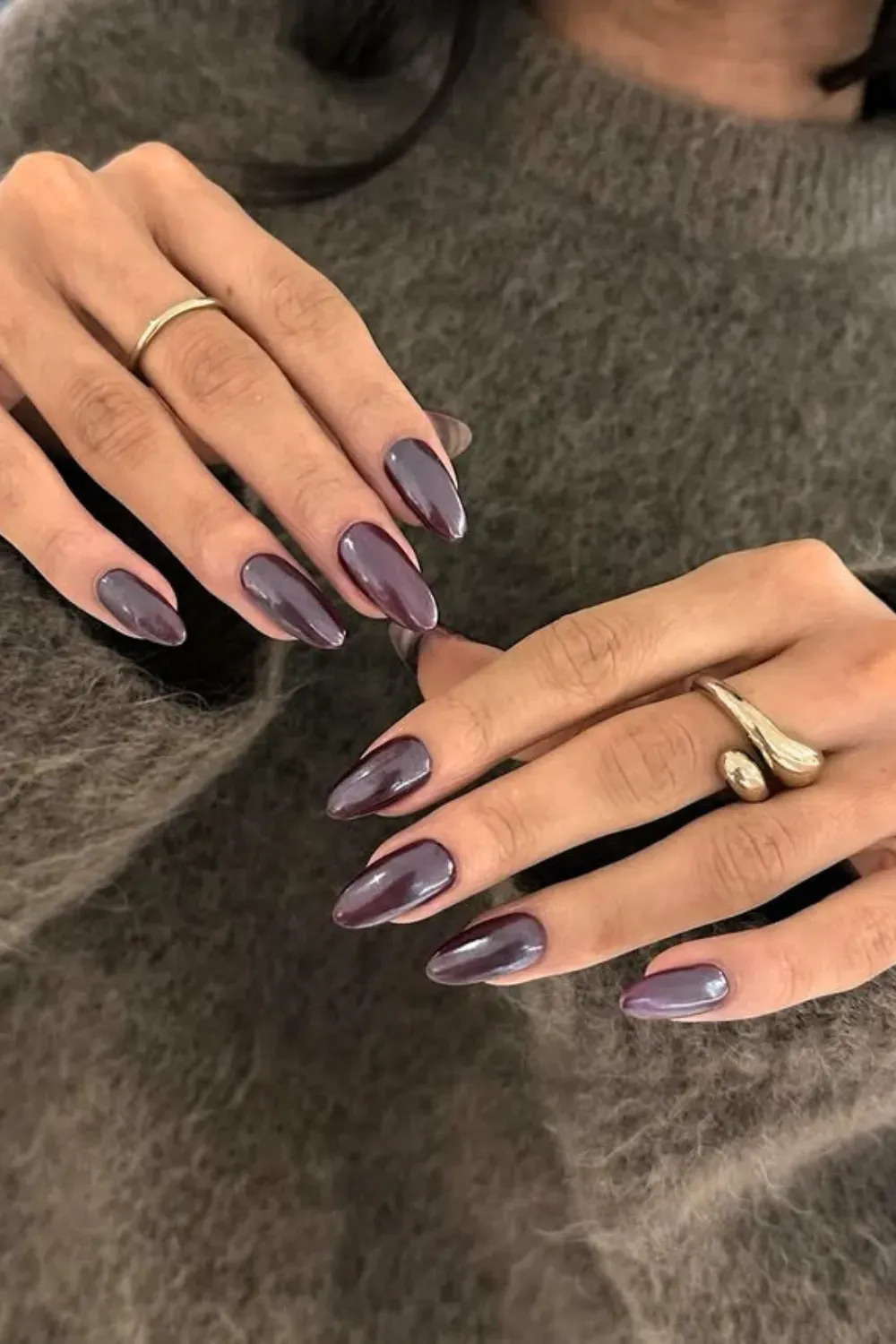 Chrome Plum Perfection: Almond-shaped nails featuring rich metallic plum or deep wine shade with a sleek chrome finish for a luxurious and sophisticated look.