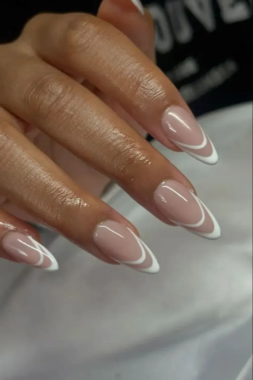 Classic White French Tip Almond Nails - Nude almond nails with bright white French tips