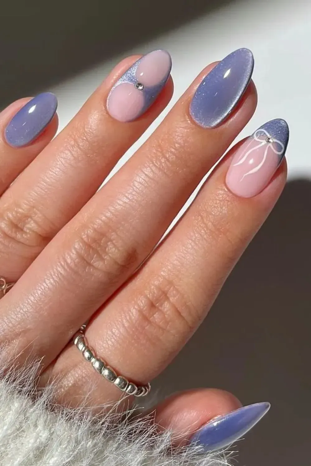Coquette Blue and Pink Cat-Eye Nails - Cat-eye blue and pink almond nails with crystal and bow accents