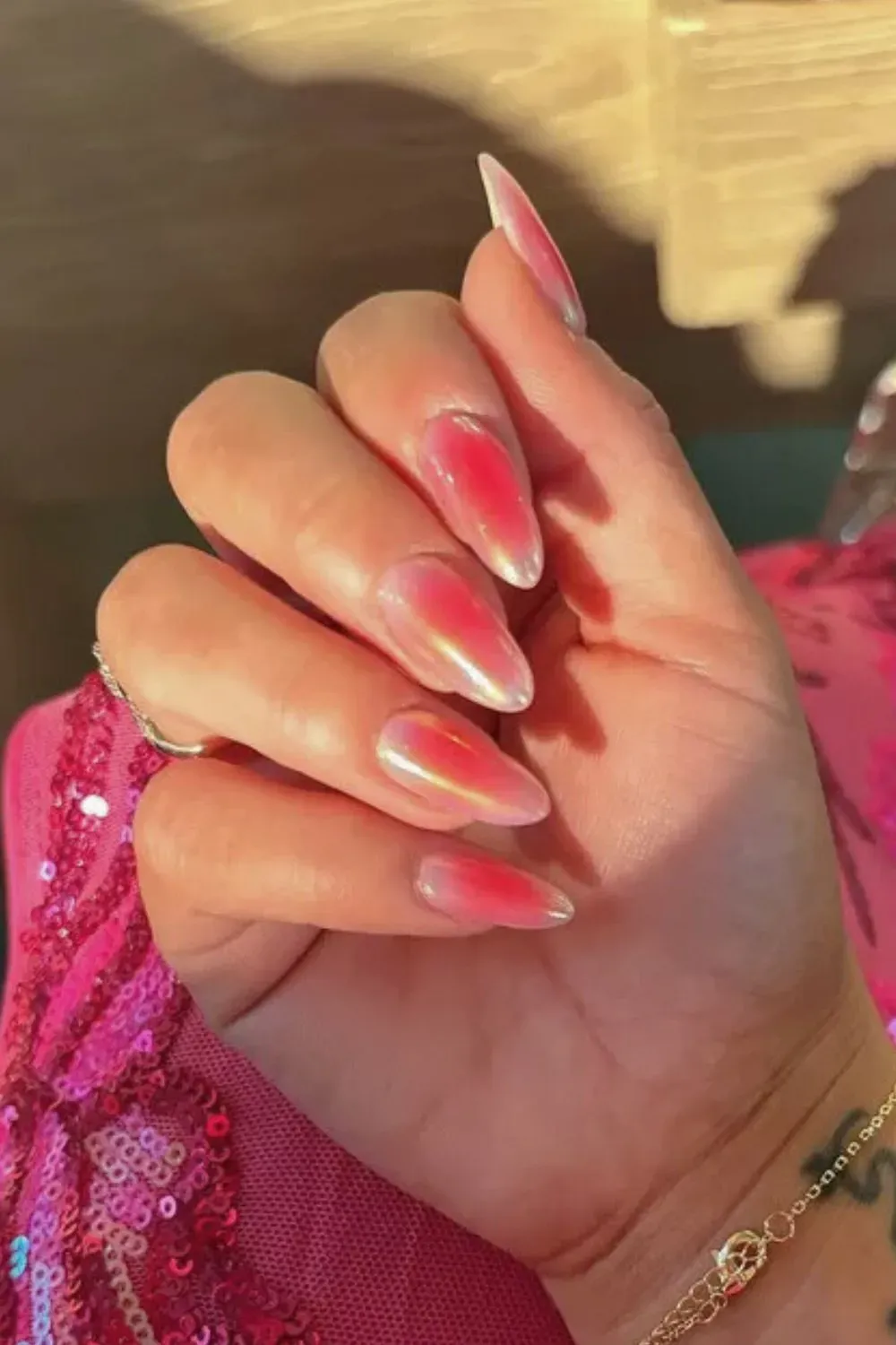 Cherry Glazed Nails - Close-up of almond-shaped glazed pink nails inspired by the cherry syrup trend