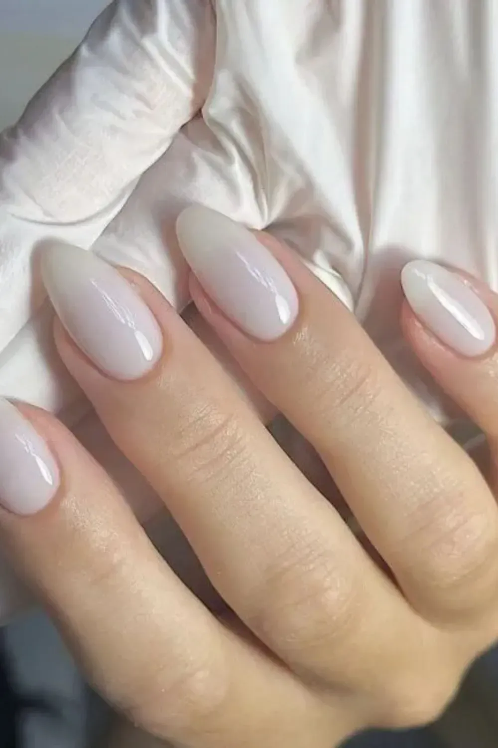 Glossy Milk Bath Nails - Almond-shaped nails with glossy, sheer white milky finish