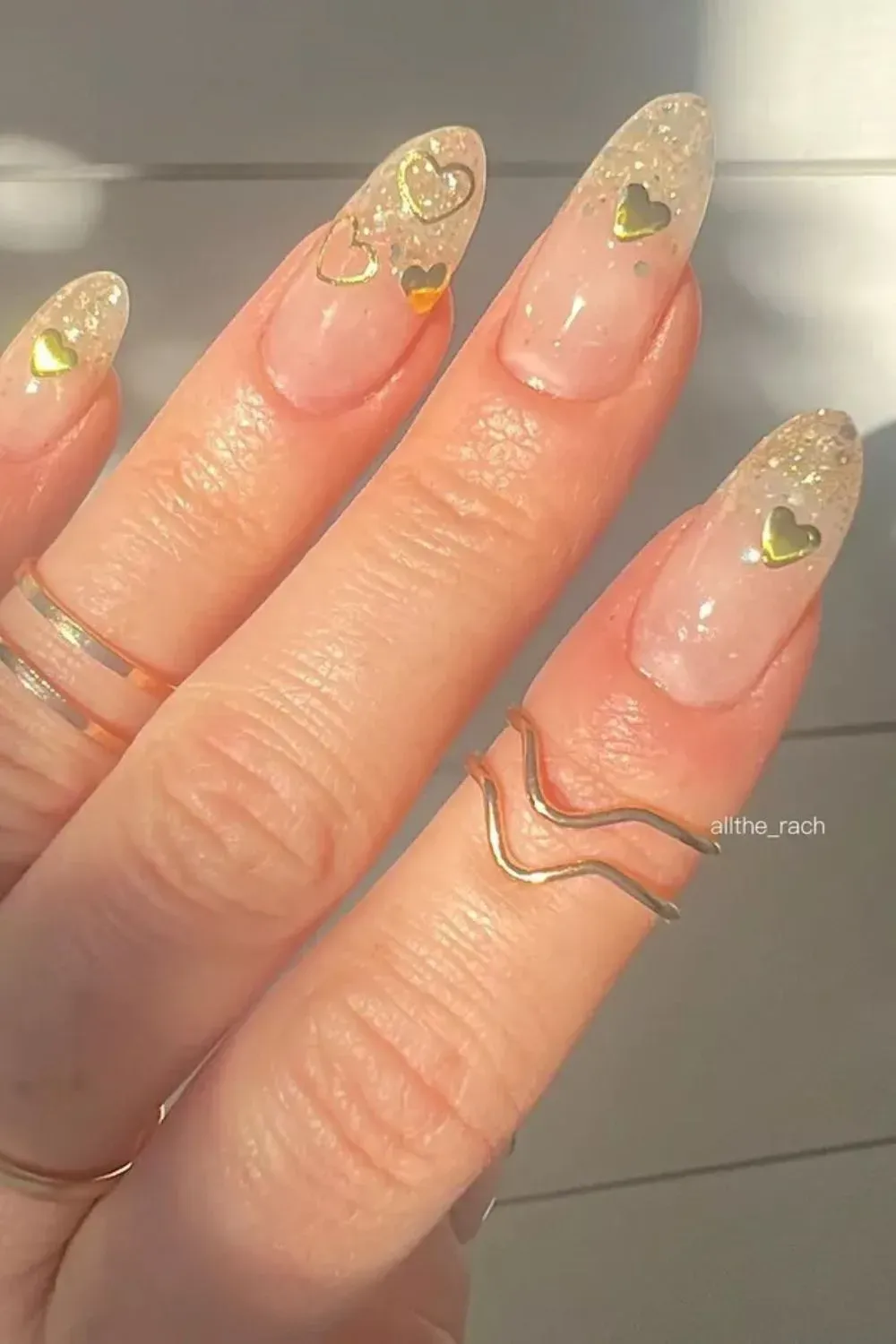 Gold Heart Glitter Nails - Clear almond nails with gold glitter and small heart decals