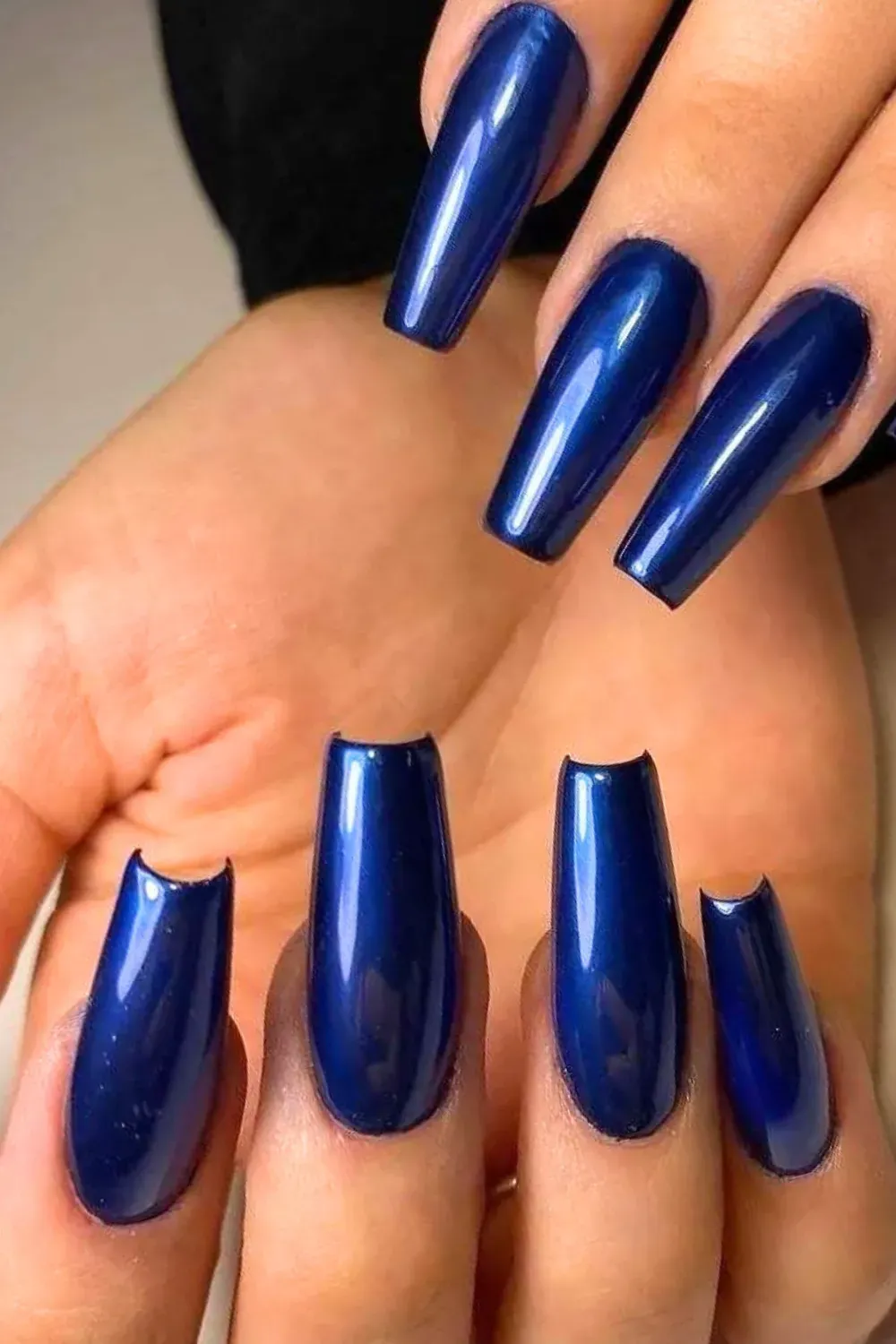 Metallic Cobalt Coffin Nails Long coffin-shaped nails painted in a vibrant, high-shine metallic cobalt blue.