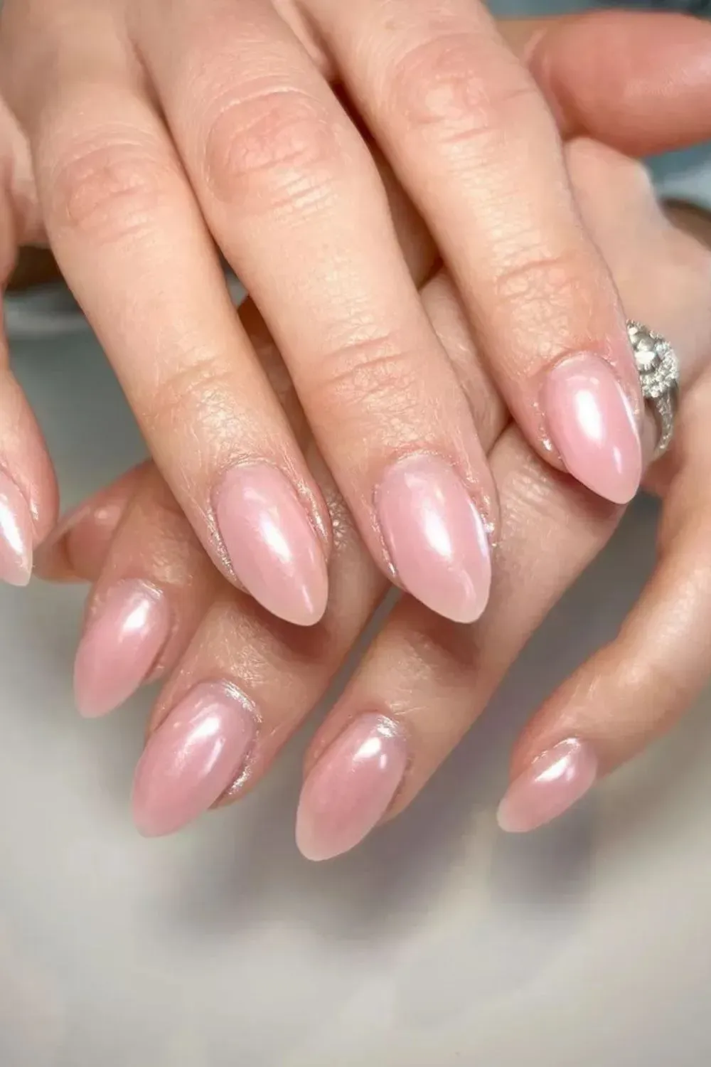 Milky Pink Glazed Donut Nails - Shiny almond nails in milky pink chrome glaze