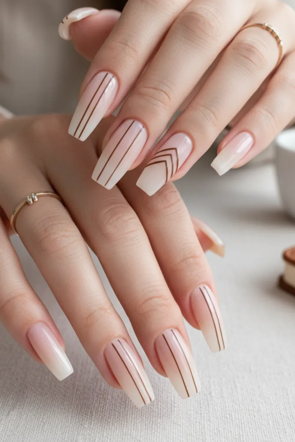 Minimalist Lines Nails - Minimalist brown line designs on a neutral base, with sleek stripes and geometric patterns for a modern, stylish manicure