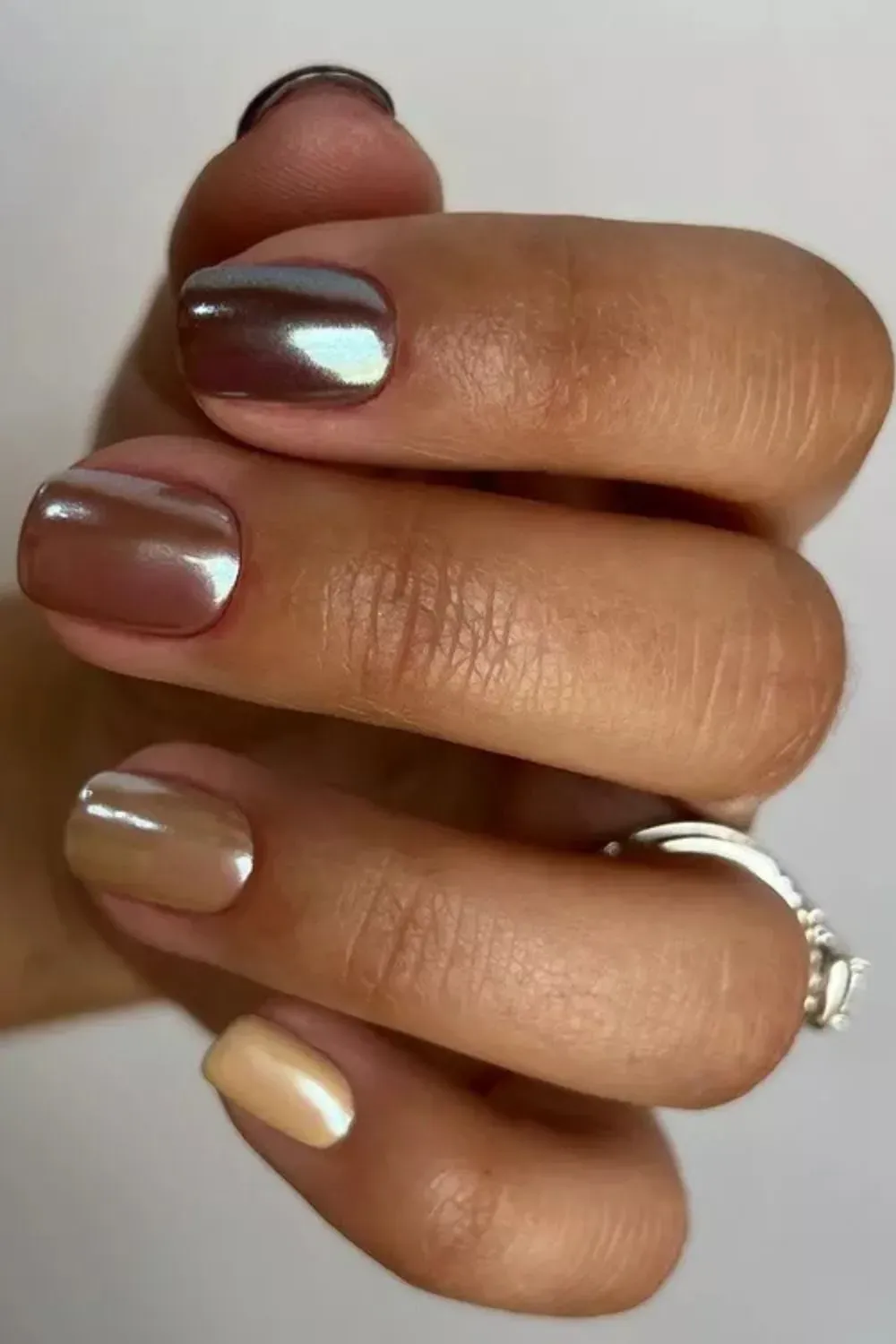 Warm Mixed Chrome Nails - Short nails with mixed warm chrome polish shades for a radiant look