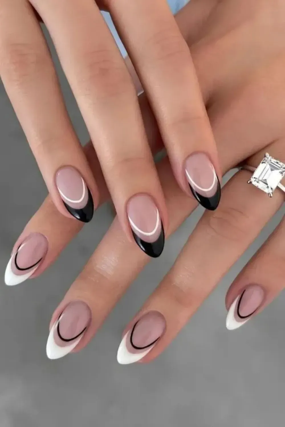 Monochrome Wavy Nail Design - Black and white almond nails with wavy contrast pattern