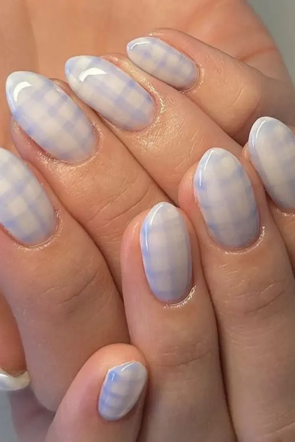 Blue Pastel Gingham Almond Nails - Pastel blue gingham print on almond-shaped nails for a cute spring design