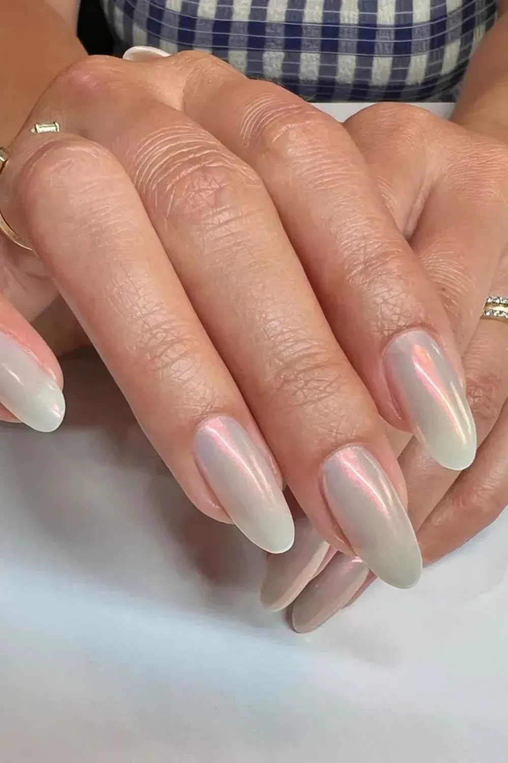 Pink Pearl Chrome Nails - Pale pink nails with a subtle shimmer and pearly sheen