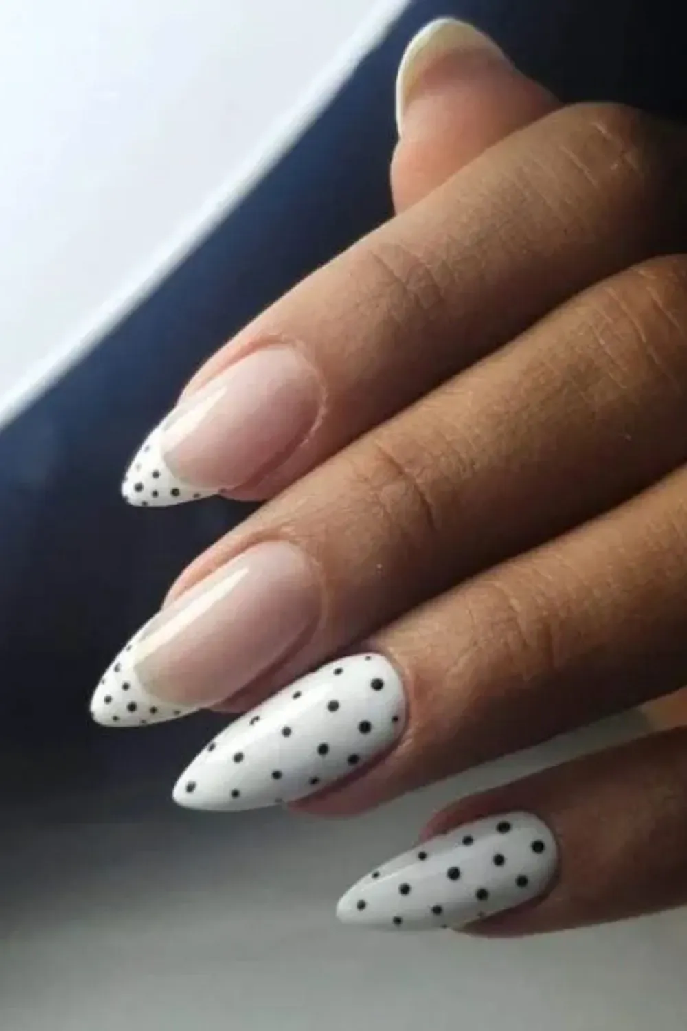 White Polka Dot French Tips - Almond nails with classic white French tips and dotted black pattern