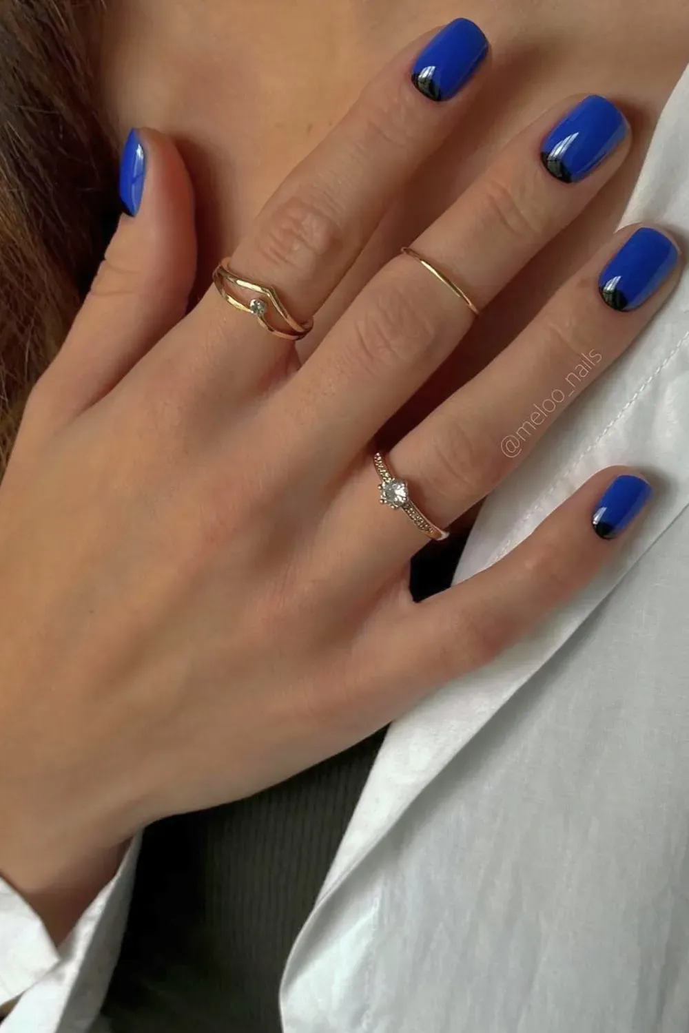 Royal Blue with Black Tip Square Nails Short square nails painted in a bright royal blue with a thin, contrasting black line across the tip.