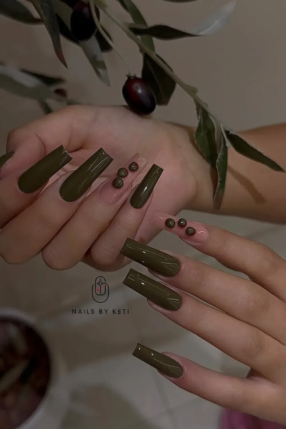 Sculptural Olive Green Coffin Nails - Long square/coffin nails in solid olive green with 3D sculpted olive spheres on the accent nails.