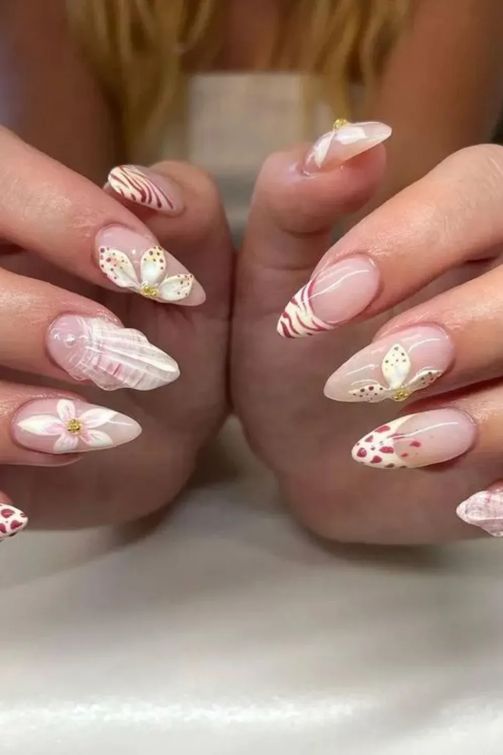 Strawberry Floral Summer Nail Art - Mixed designs of strawberries, flowers, and stripes on almond nails