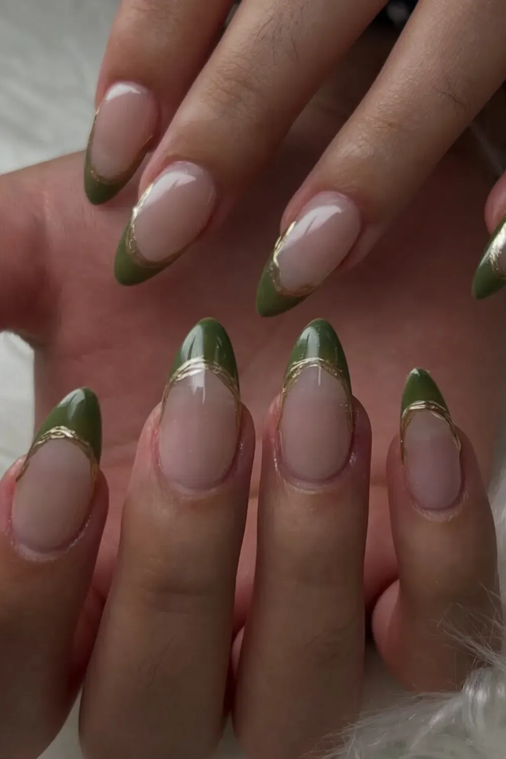 Green & Gold Almond French Tips: Elegant almond nails with olive green French tips and gold foil accents