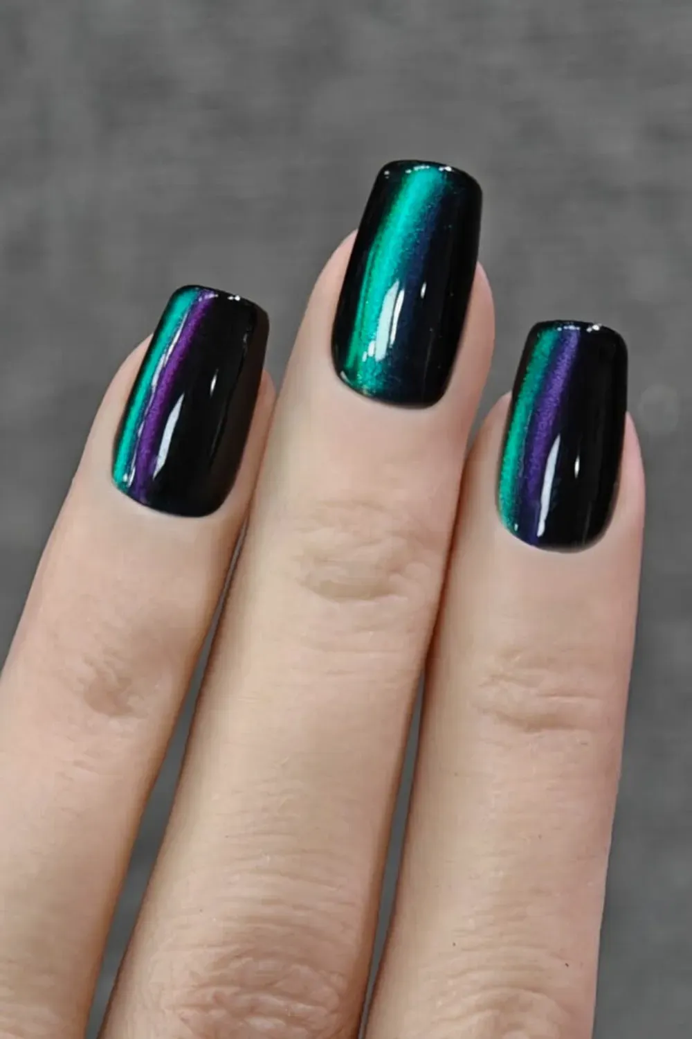 Teal to purple multichrome shifting magnetic nail polish on short nails