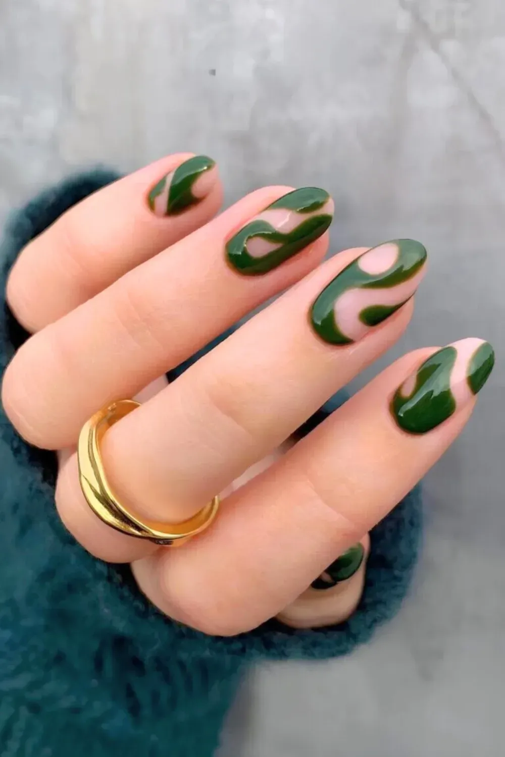 Deep Forest Green Abstract Swirl Oval Nails - Oval nails featuring deep forest green abstract swirls over a sheer, neutral base color.