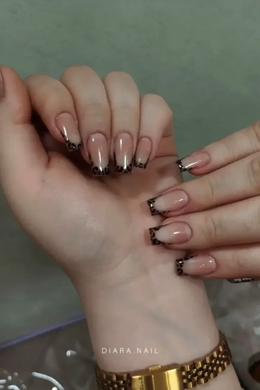 Leopard Print Square French: Square nails with a fashionable leopard print French tip.