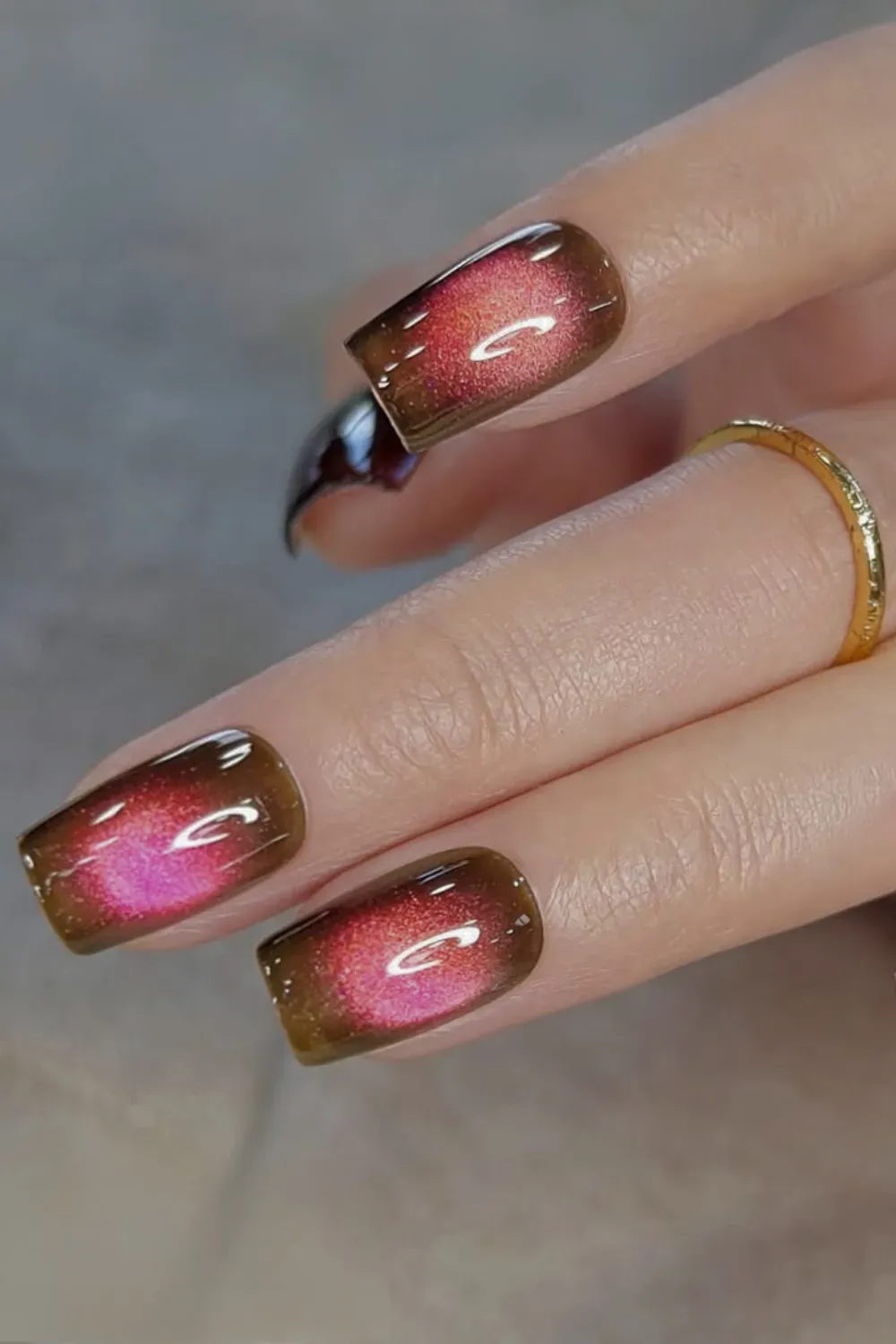 Radiant gemstone red-to-pink shifting cat eye polish suitable for short or long nails