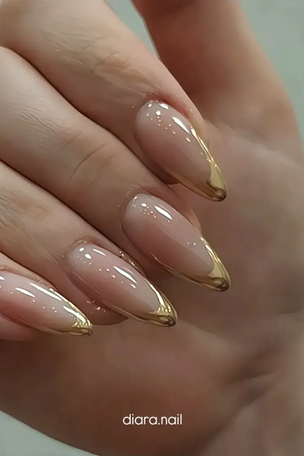 Golden Glamour Almond French: Almond-shaped nails with a stunning all-gold French tip.