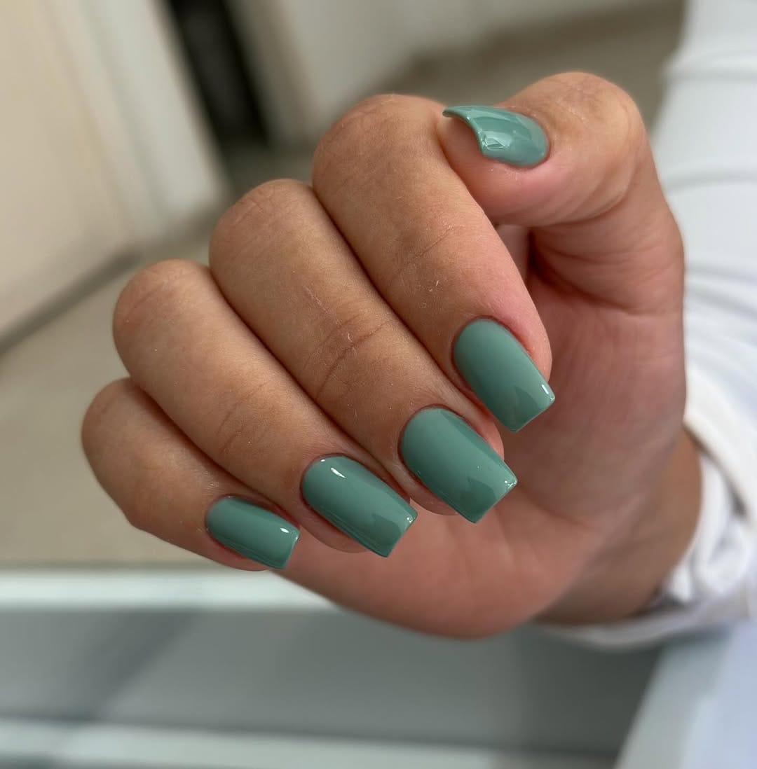 Glossy Square Dusty Teal Green Nails - Medium square nails painted a solid, glossy, dark dusty teal green color.